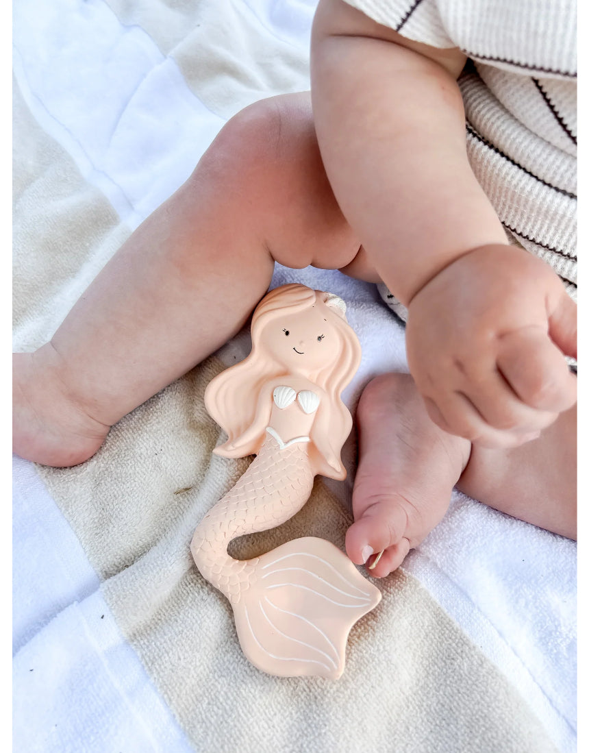 Winnie Parkes Maeve the Mermaid rubber teether in peach, soft and safe teething toy for babies, with detailed mermaid design.
