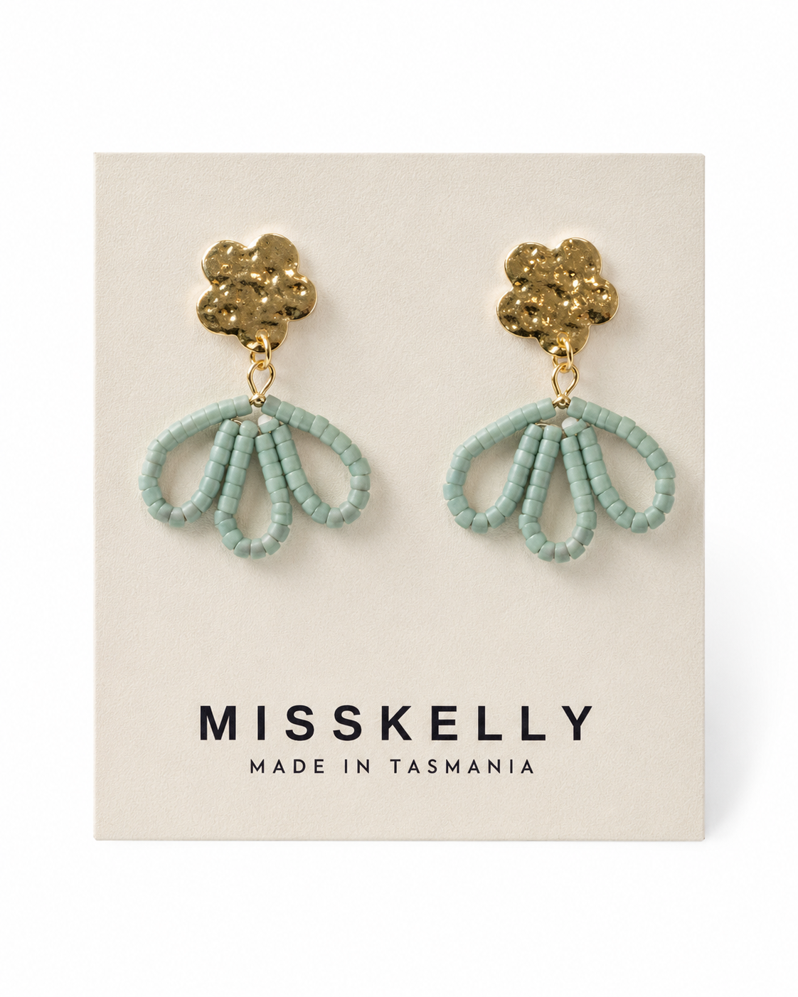 Gold floral top earrings by Miss Kelly featuring petal-shaped design and intricate detailing.