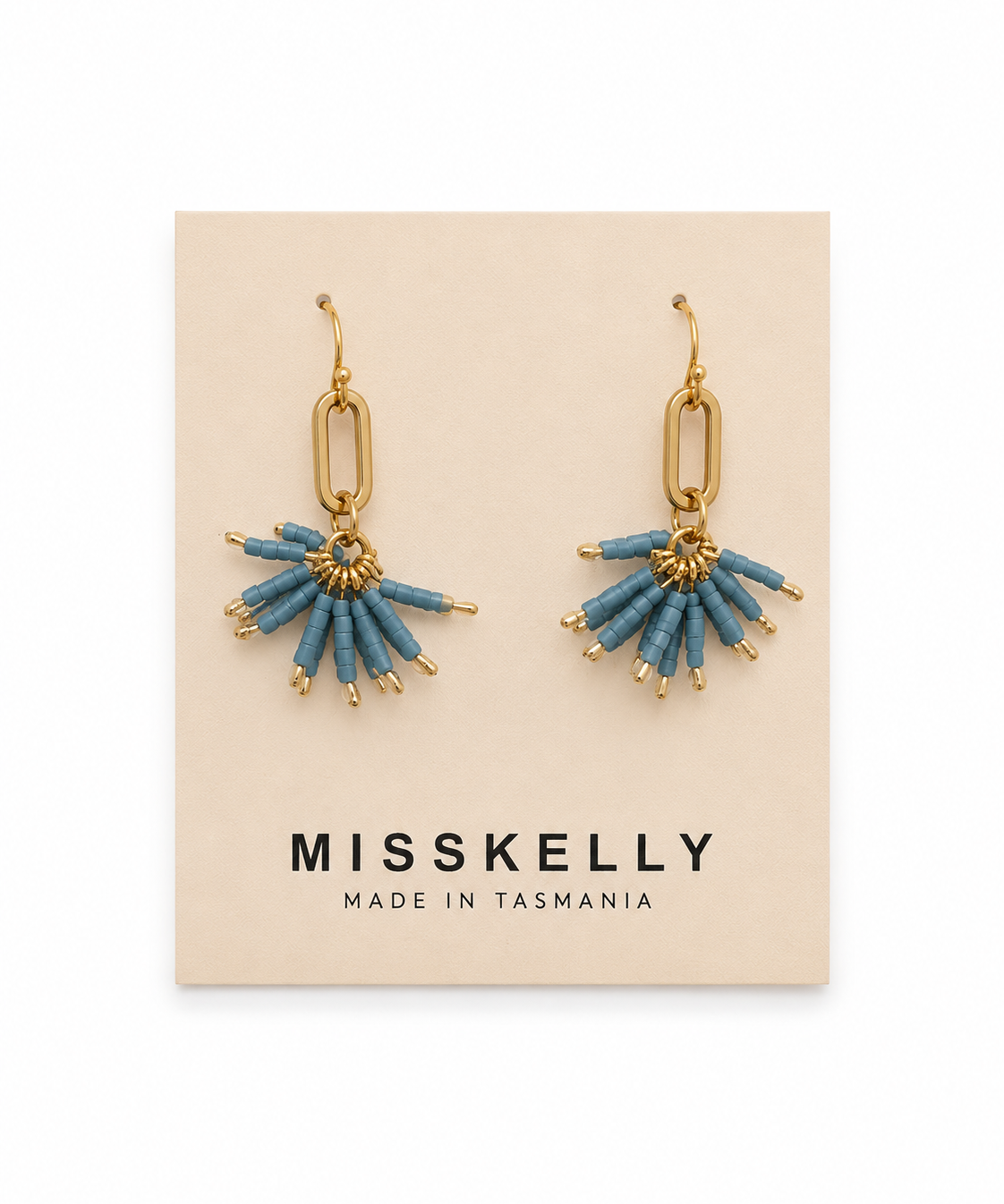 Miss Kelly Fireworks earrings featuring vibrant, colorful designs with star-shaped accents, stylishly displayed on a white background.