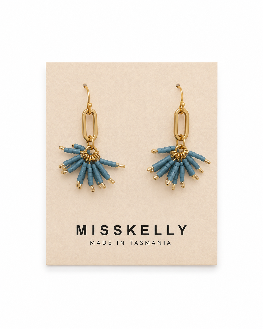 Miss Kelly Fireworks earrings featuring vibrant, colorful designs with star-shaped accents, stylishly displayed on a white background.