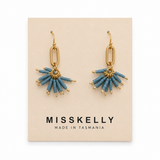 Miss Kelly Fireworks earrings featuring vibrant, colorful designs with star-shaped accents, stylishly displayed on a white background.