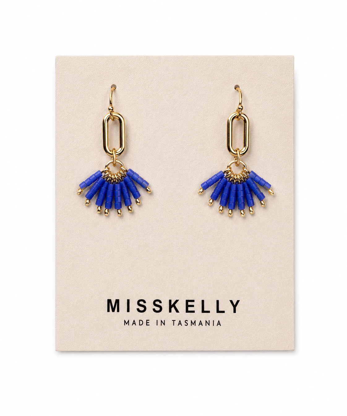 Gold Miss Kelly Fireworks Earring with intricate design and dangling elements, stylish jewelry for modern fashion.