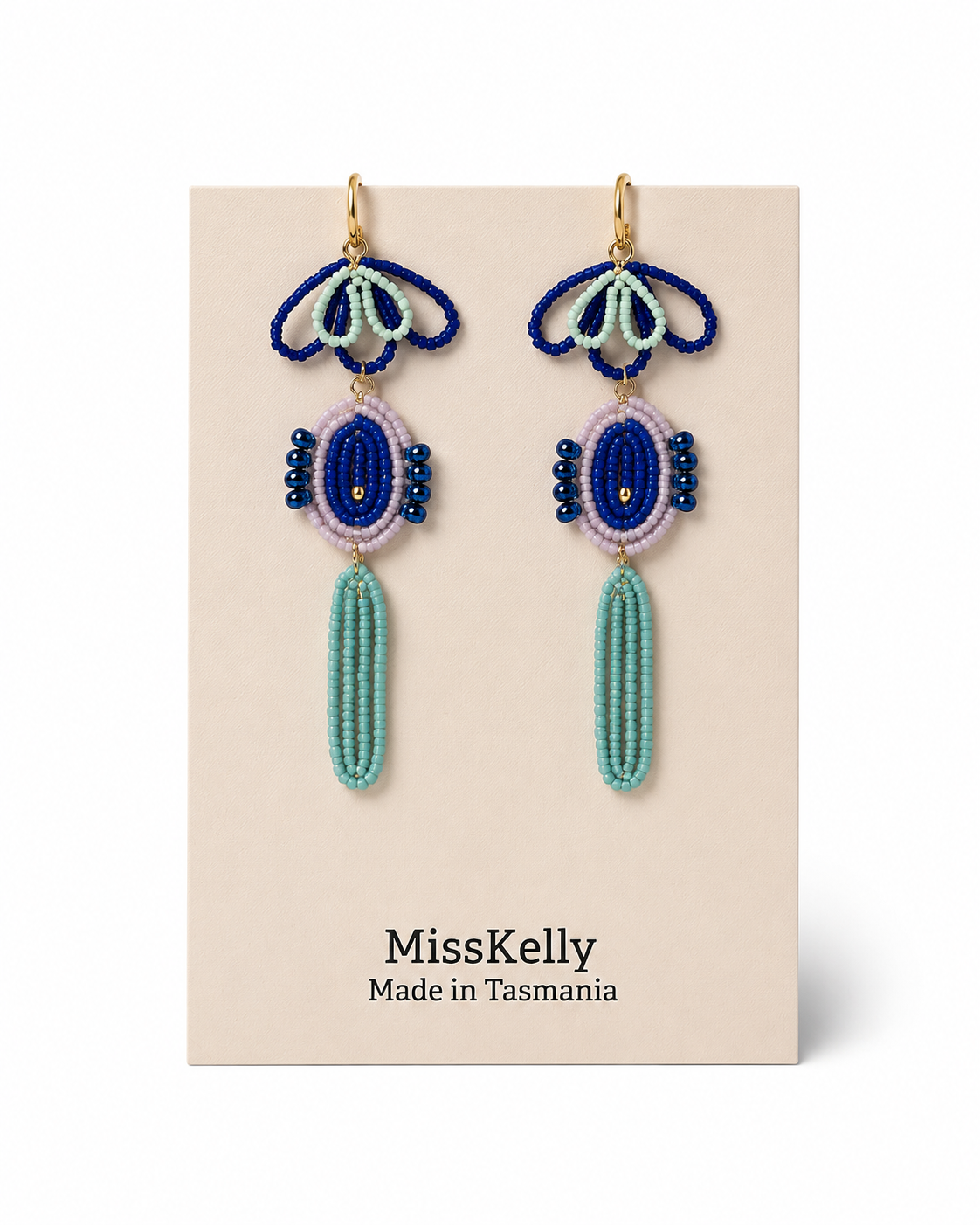 Miss Kelly Madison statement earrings featuring bold, stylish design with intricate detailing in gold-tone finish.