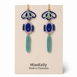 Miss Kelly Madison statement earrings featuring bold, stylish design with intricate detailing in gold-tone finish.
