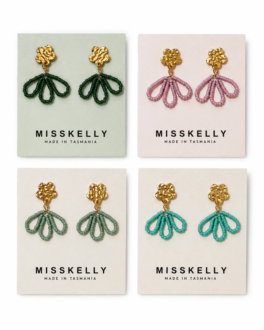 Gold floral earrings by Miss Kelly featuring petal-shaped design, elegant jewelry accessory for women.