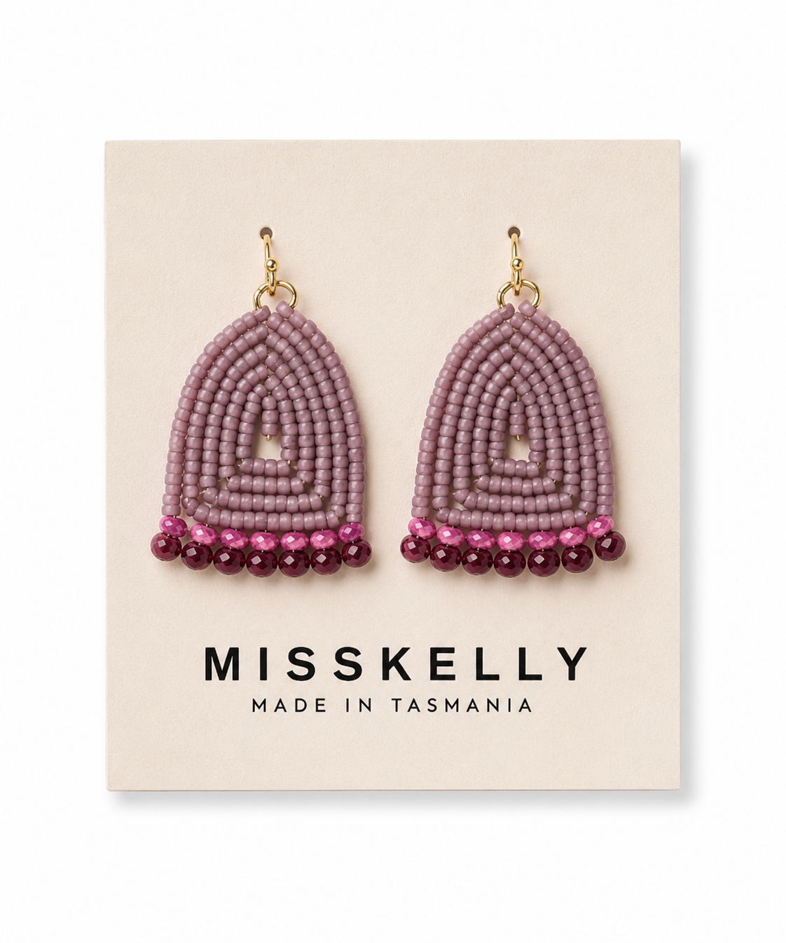 Miss Kelly Donna triangle earrings, gold-tone dangle earrings with geometric design and textured finish, stylish jewelry accessory.