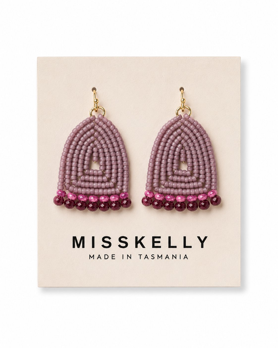 Miss Kelly Donna triangle earrings, gold-tone dangle earrings with geometric design and textured finish, stylish jewelry accessory.