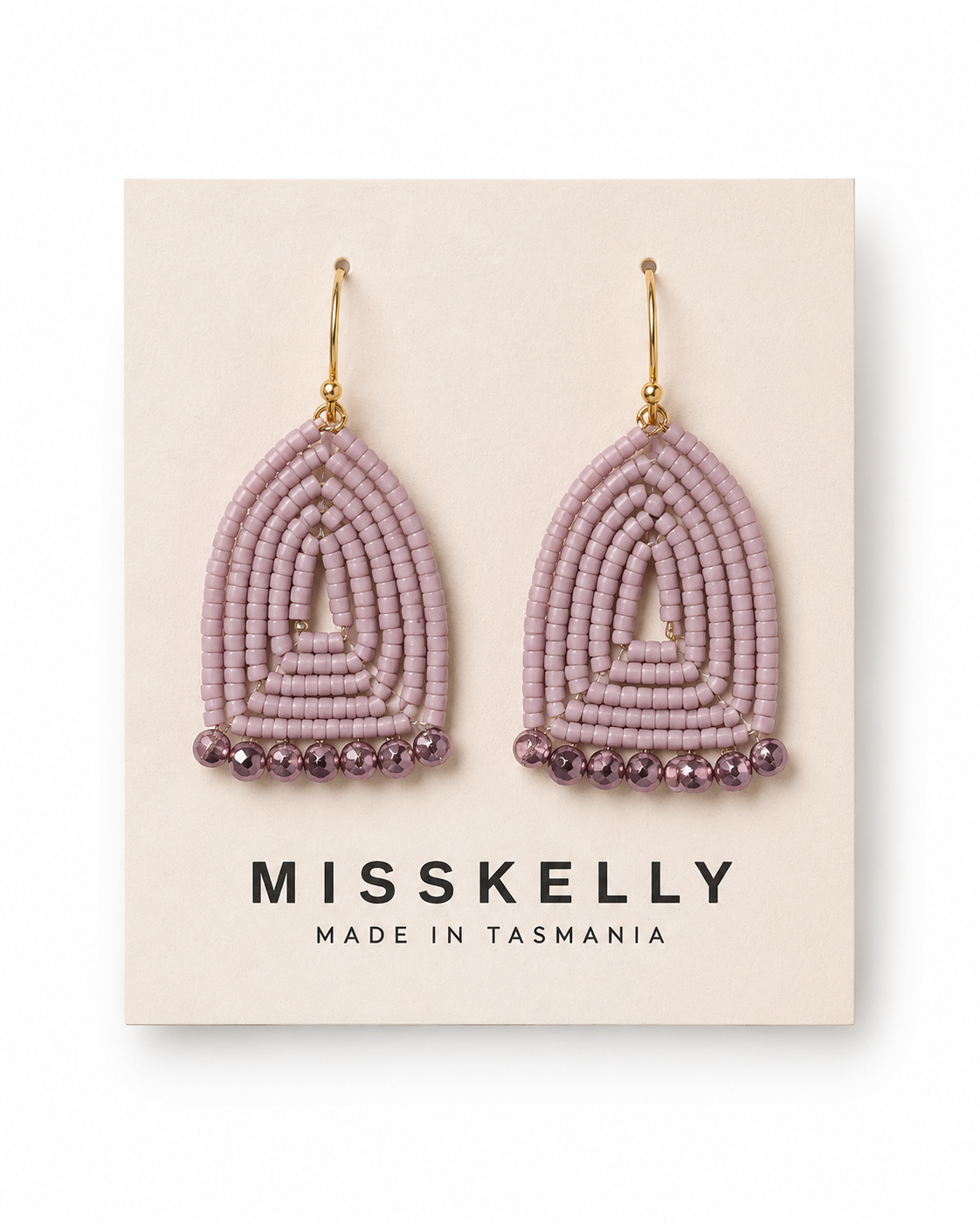 Miss Kelly Donna triangle earrings featuring gold-toned metal and geometric design, perfect for stylish accessorizing.