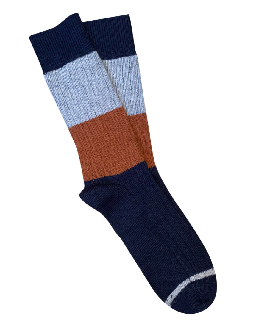 Tightology Chunky Rib Merino Wool Socks in midnight blue, featuring thick ribbed knitting and cozy, warm wool fabric.