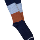 Tightology Chunky Rib Merino Wool Socks in midnight blue, featuring thick ribbed knitting and cozy, warm wool fabric.