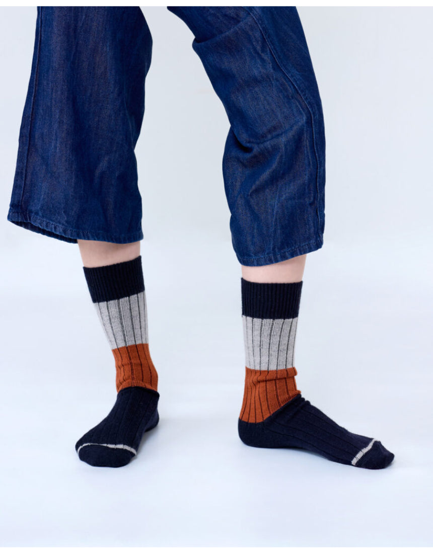 Tightology chunky rib Merino wool socks in midnight color, featuring thick, cozy knit for warmth and comfort.