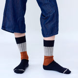 Tightology chunky rib Merino wool socks in midnight color, featuring thick, cozy knit for warmth and comfort.