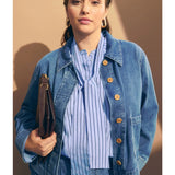 Elk Hedi Shirt in sparkle denim, shown on a hanger with detailed stitching and button front, stylish casual clothing.
