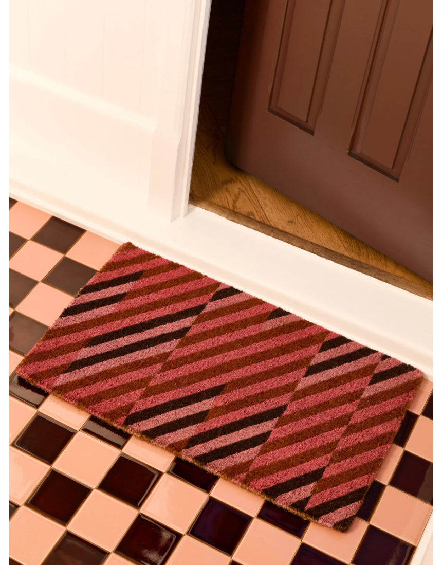 Bonnie & Neil pink patchwork door mat with colorful fabric squares, suitable for indoor or outdoor entryways.
