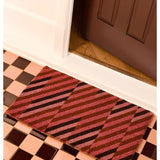 Bonnie & Neil pink patchwork door mat with colorful fabric squares, suitable for indoor or outdoor entryways.
