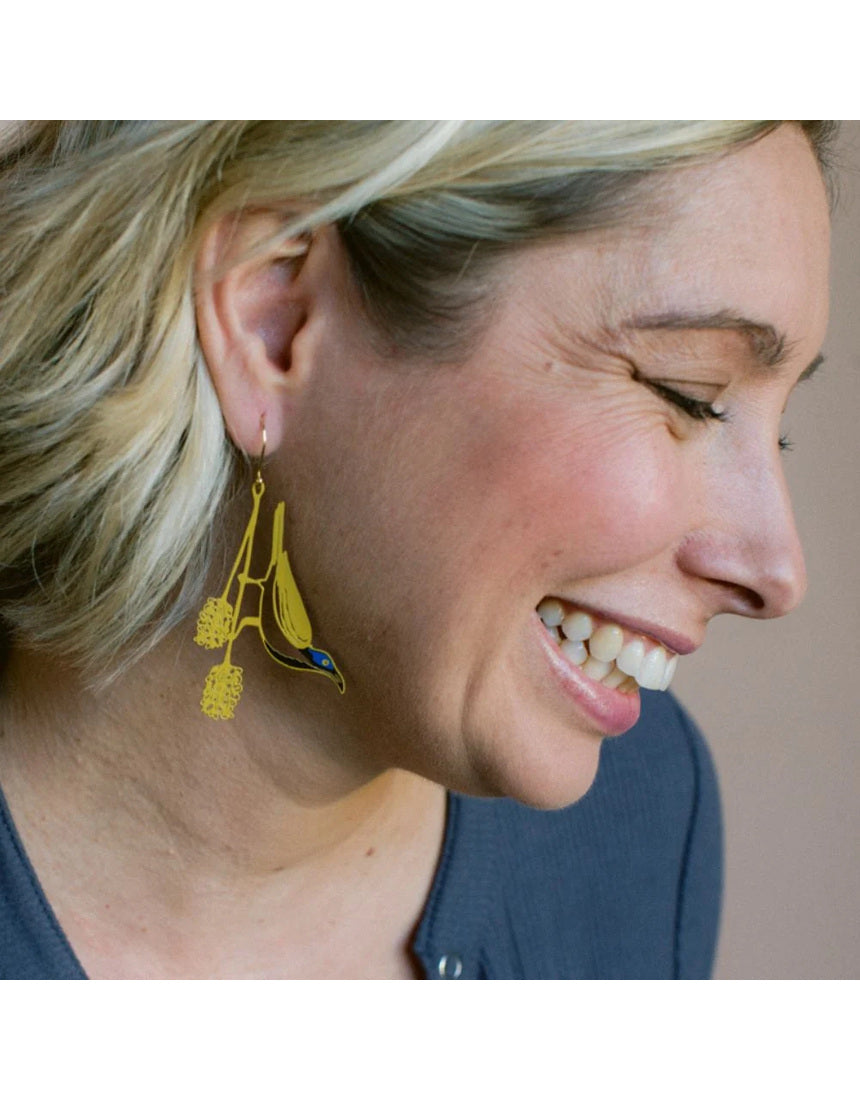 Denz Blue Faced Honeyeater earrings worn by model