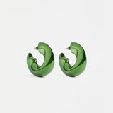 Elk Askla hoop earrings in Milan Green featuring bold circular design and vibrant green color.