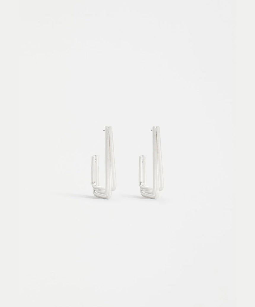 Silver Sokar earrings by Elk featuring sleek, modern design with polished silver finish and intricate detailing.