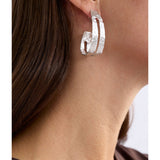 Silver Elk Amner large hoop earring from ELK The Label, featuring smooth, rounded silver hoops with a modern design.