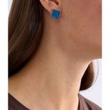 ELK The Label Ocean Blue Silenn small stud earrings with a sleek, minimalist design on a white background.