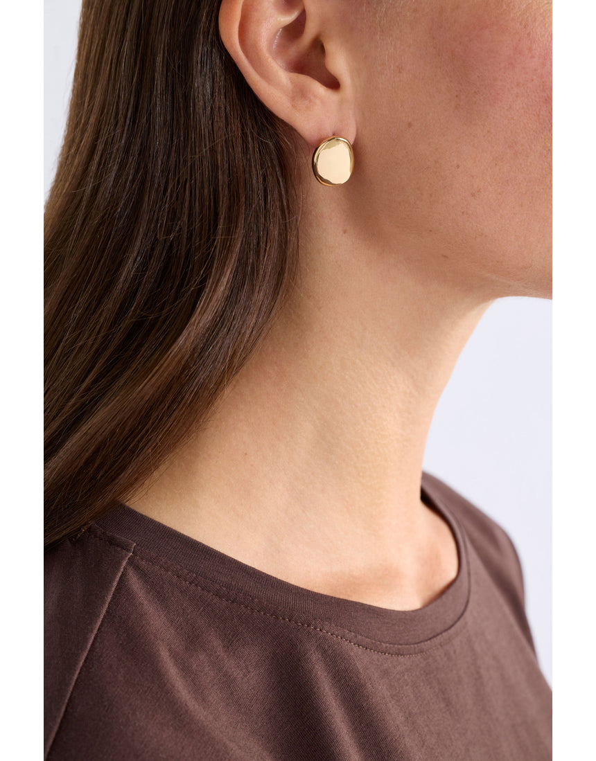 Gold Elk Atur Mini Stud Earrings by ELK The Label featuring small, sleek gold stud designs on a white background.