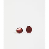 ELK The Label Atur Mini Stud Earring in Espresso, small gold-tone earring with a minimalist design, close-up view.