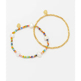Estella Bartlett rainbow pearl bracelet set featuring colorful pearl bracelets with silver accents on a white background.