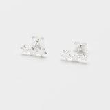 Silver plated Estella Bartlett star crawler stud earrings, showcasing a delicate celestial design in jewelry style.
