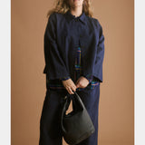 Elk Decla Jean in denim, featuring a fitted style with visible stitching and classic five-pocket design.
