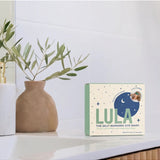 Lula self-warming eye mask with eucalyptus and tea tree, shown lying flat, designed to soothe and relax tired eyes.