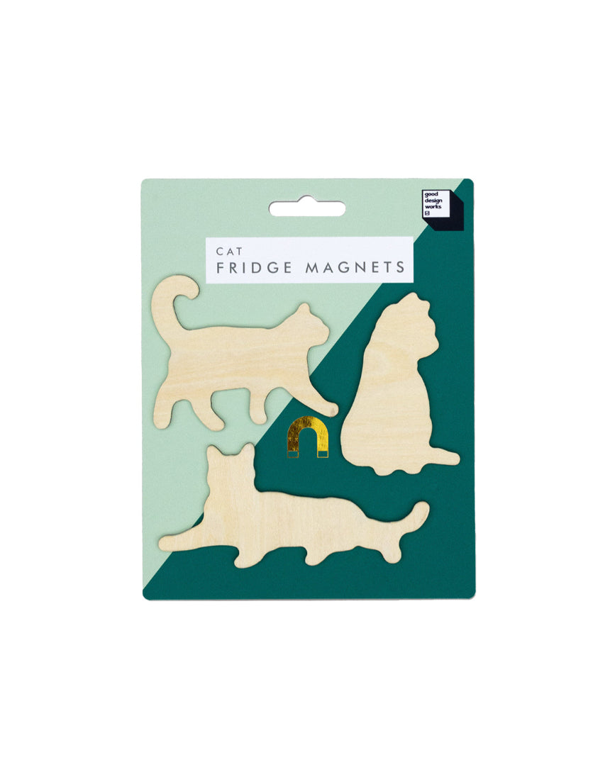 Colorful Suck UK fridge magnets featuring playful cat designs, perfect for decorating and organizing your kitchen space.