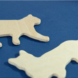Set of Suck UK fridge magnets featuring colorful cat designs on a white background, ideal for decorating refrigerators.