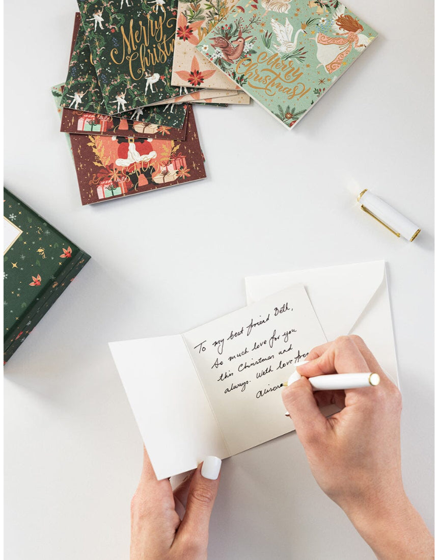 Bespoke Letterpress 12-pack Christmas greeting card box set featuring small square cards with festive holiday designs.