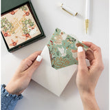Set of 12 Bespoke Letterpress Christmas greeting cards in a square box, featuring festive designs for holiday notes.