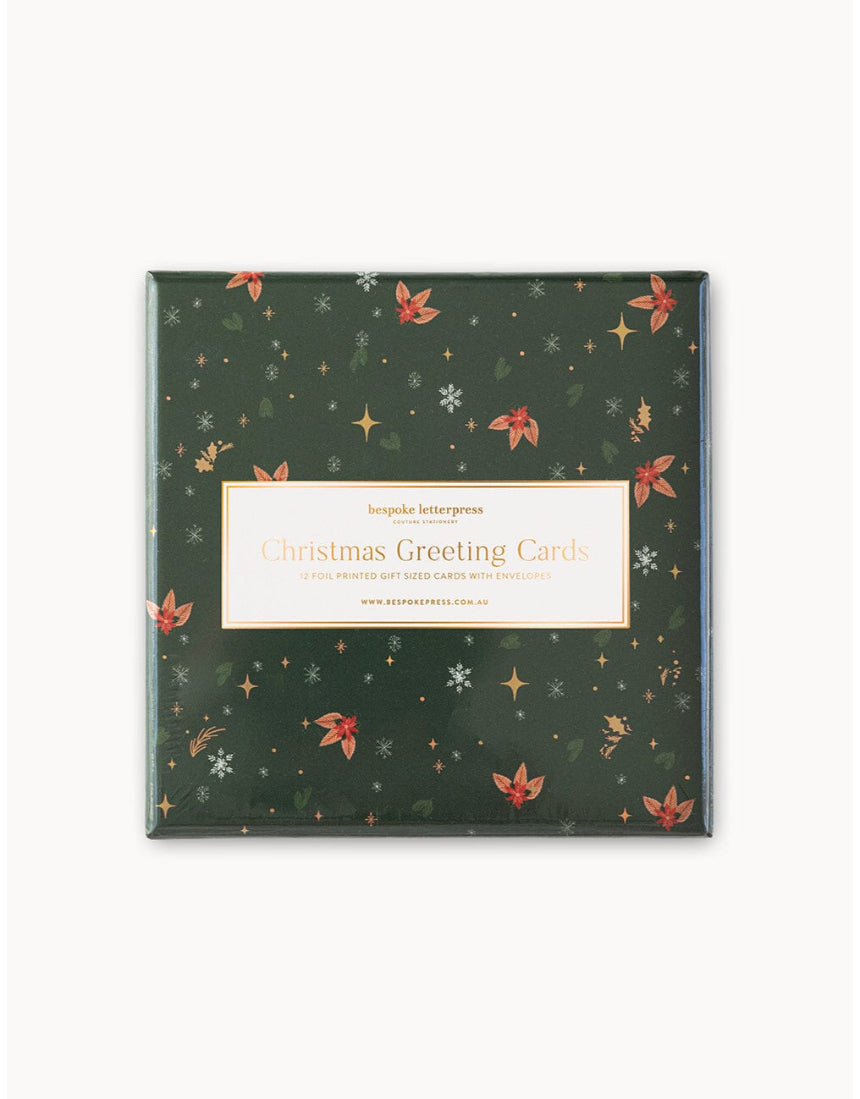Bespoke Letterpress Christmas greeting card boxset featuring 12 small square cards with festive holiday designs.
