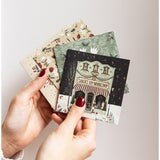 Bespoke Letterpress Christmas Village 12-pack square greeting card box set with festive holiday designs and elegant lettering.