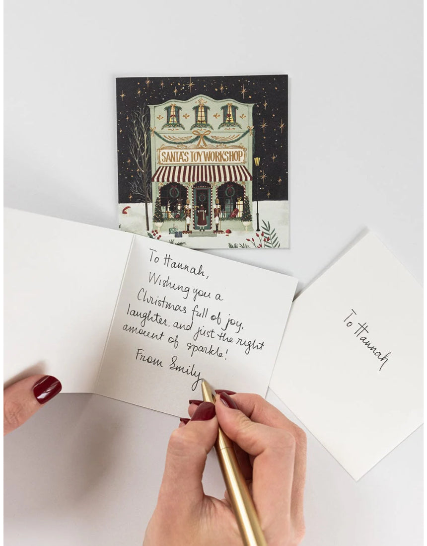 Bespoke Letterpress Christmas Village 12-pack square greeting card box set featuring festive holiday village illustrations.