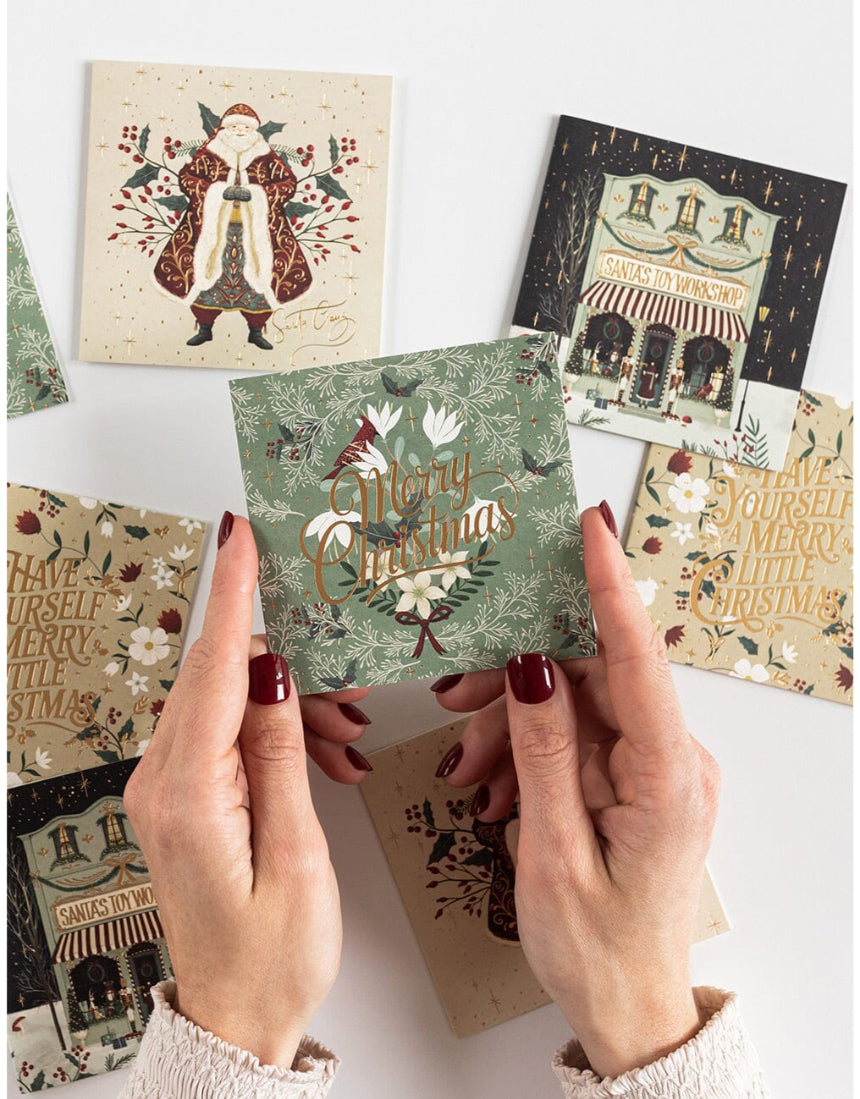 Bespoke Letterpress Christmas Village 12-pack square greeting card box set with festive holiday village illustrations.