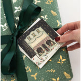 Set of 12 Christmas Village letterpress greeting cards in a square box, featuring festive holiday illustrations by Bespoke Letterpress.