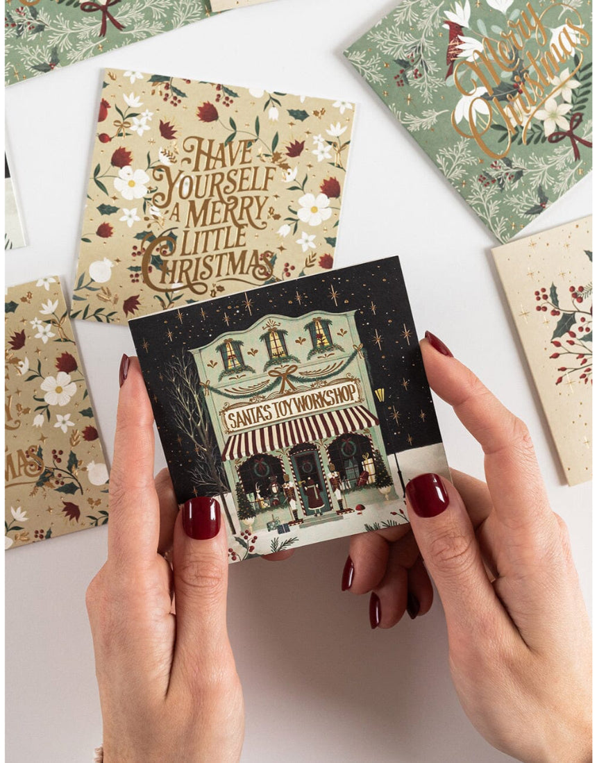 Bespoke Letterpress Christmas Village 12-pack square greeting card boxset with festive holiday village design on high-quality note cards.