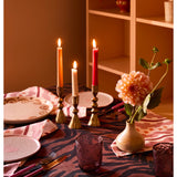 Bonnie and Neil Gem Smoke glass tumbler with a sleek, smoky design, placed on a dining table with elegant decor.