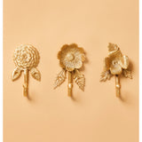 Brass Daisy Wall Hook by Bonnie and Neil, featuring a delicate daisy flower design for stylish wall organization.
