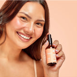 Lula Happy Mist essential oil bottle with a colorful label, used for creating a calming and uplifting atmosphere.