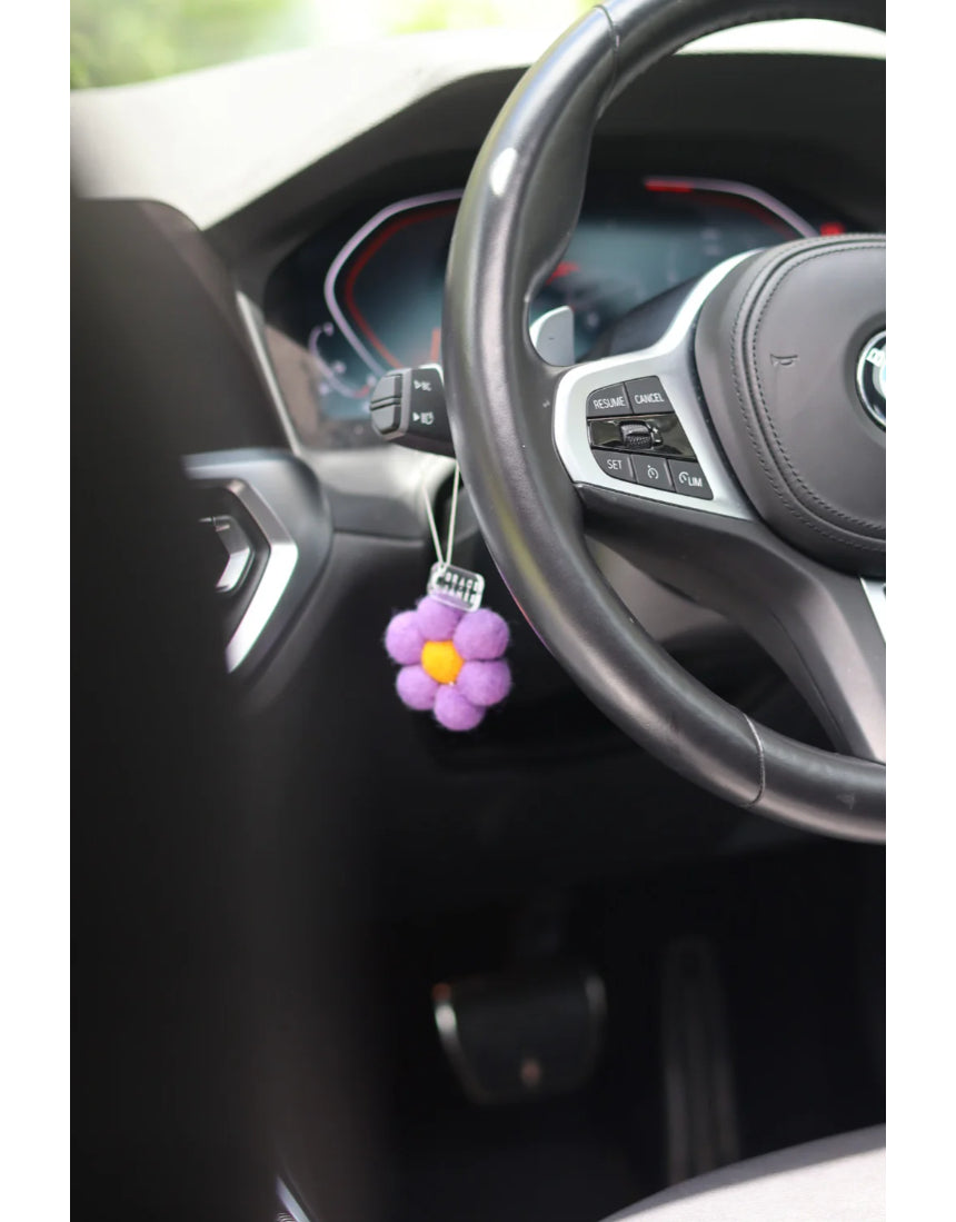 Grace & James Tigerlily & Jasmine felt air freshener with floral design and elegant scent depiction in a close-up image.