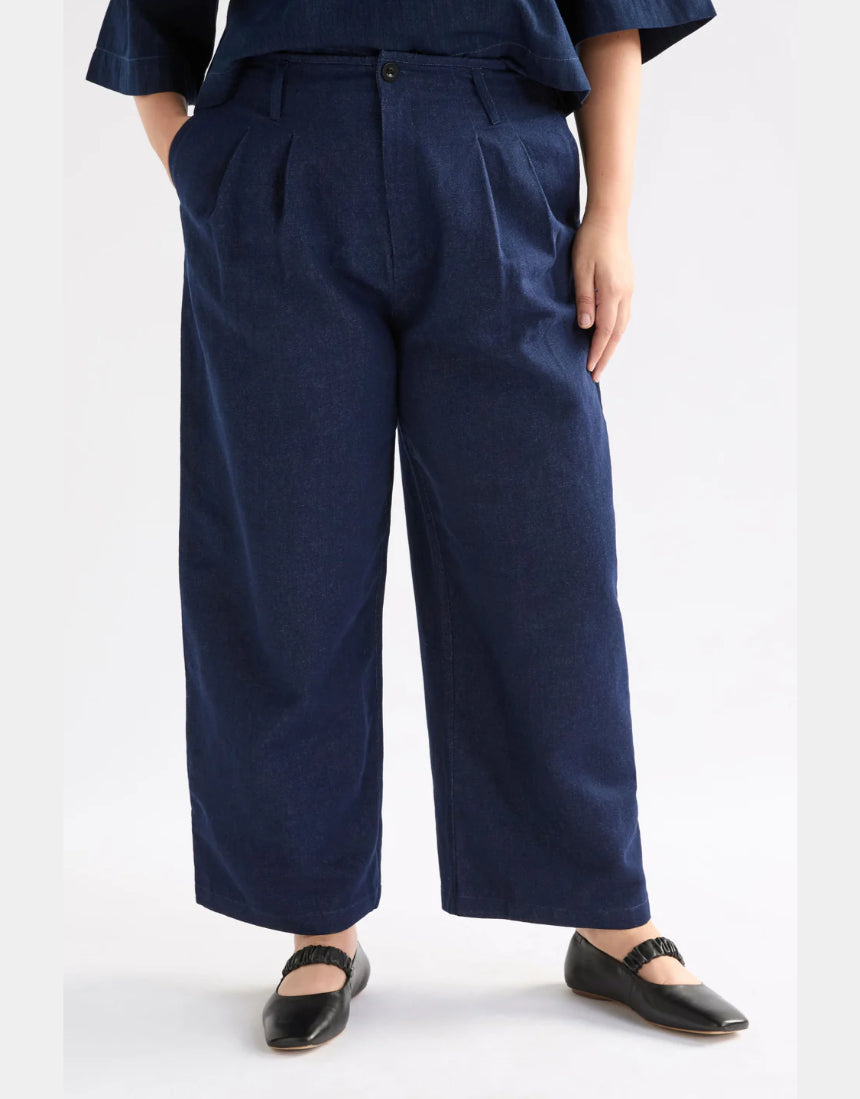 Dark blue Elk Decla Jean pants showing fitted denim with subtle whiskering and classic five-pocket design.