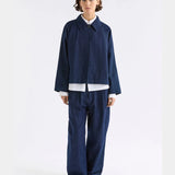 Dark blue Elk Decla Jean clothing with classic fit and stitching, shown on a hanger against a neutral background.