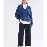 Elk Otillia sweater in blue and silver, featuring a cozy knit texture and relaxed fit, displayed on a neutral background.