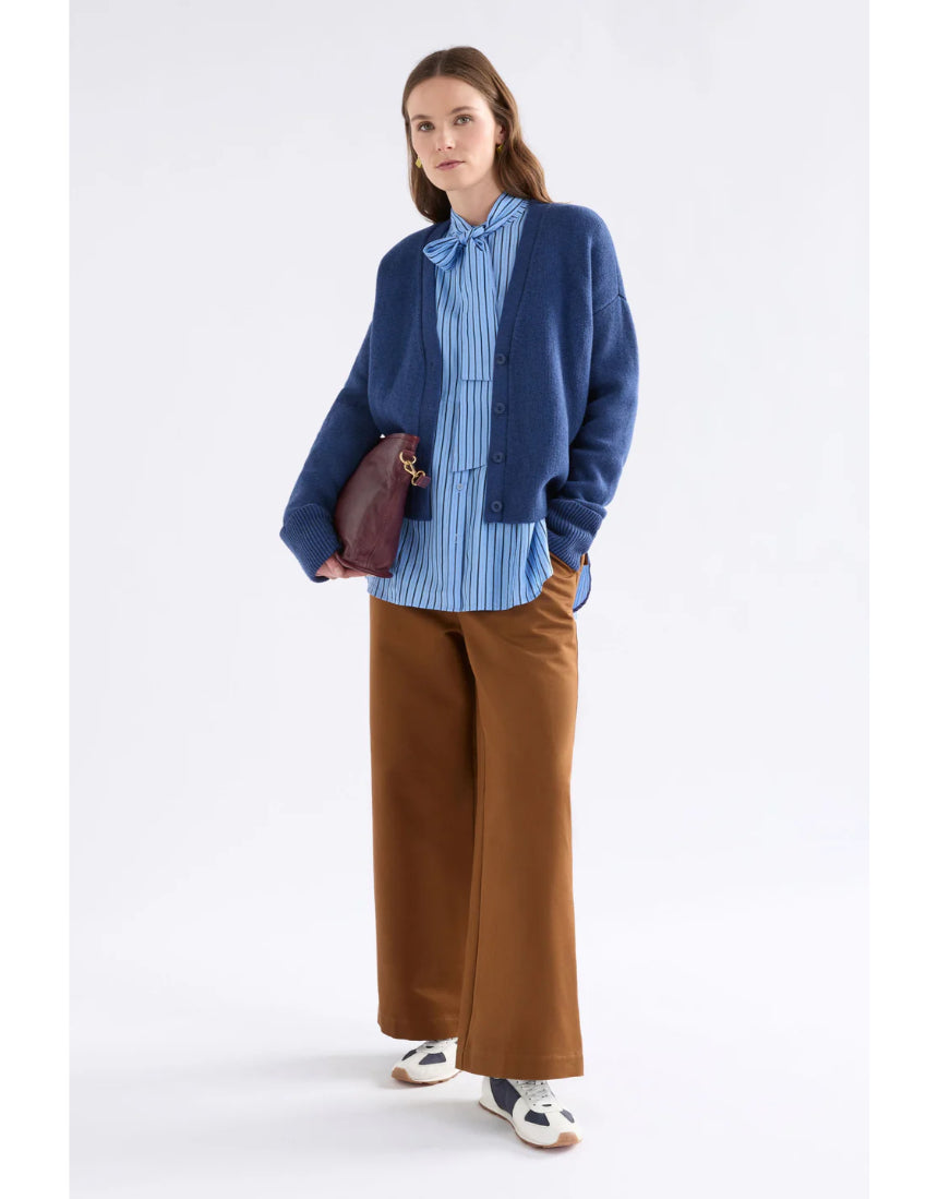 Elk Klee Cardi in bright navy, a cozy knitted cardigan with a textured pattern, displayed on a plain background.