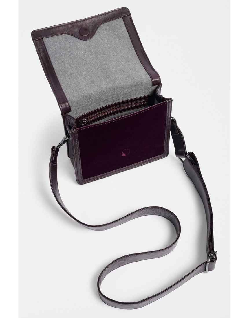 ELK The Label Vel Crossbody Bag in mulberry leather, featuring a sleek design and adjustable strap for everyday use.