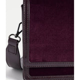 ELK The Label Vel Crossbody Bag in Mulberry leather, featuring a sleek design with adjustable strap and compact size.